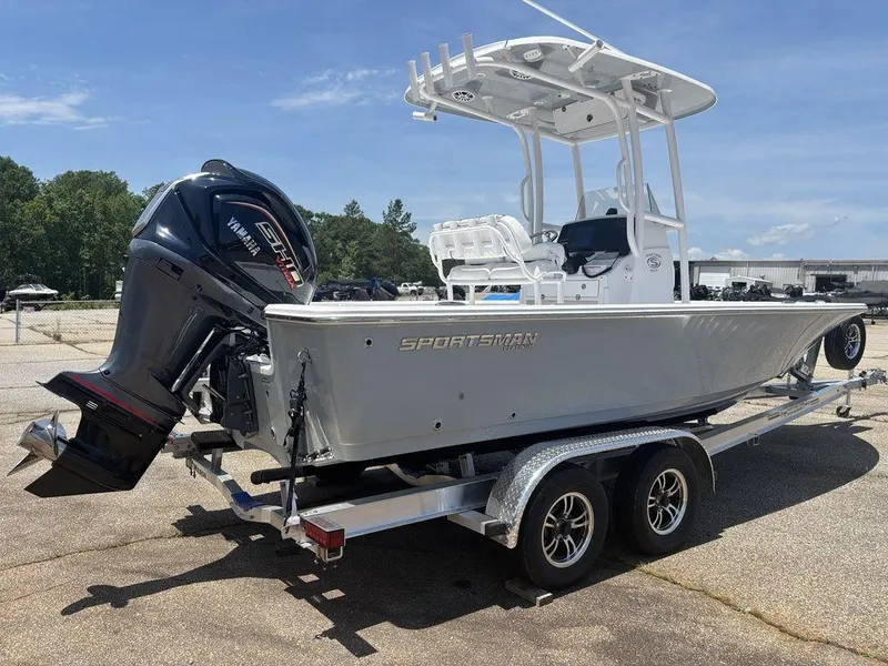 Slide: The Image of 2024 Sportsman Masters 227 Bay boat on trailer, featuring Yamaha outboard motor. - 5