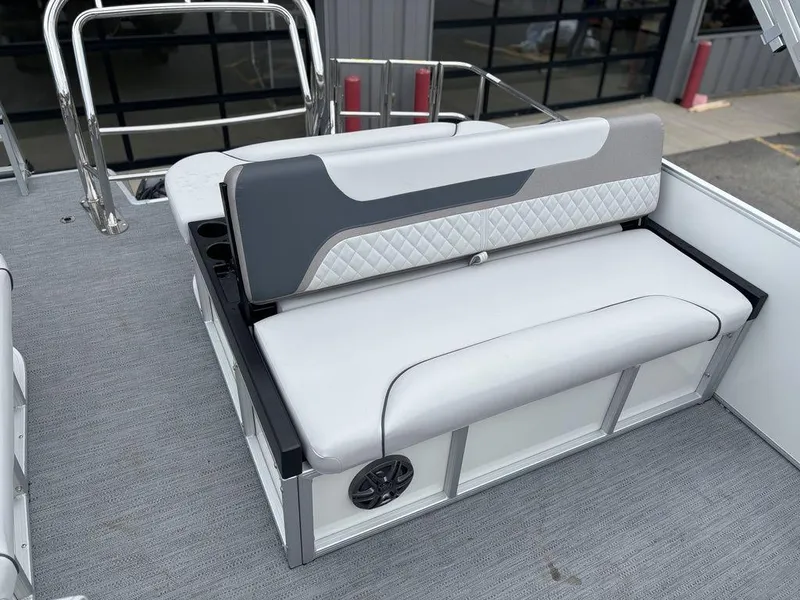 Slide: The Image of 2025 Godfrey SWEETWATER 2286 SFL boat seating with modern design and speaker system. - 12