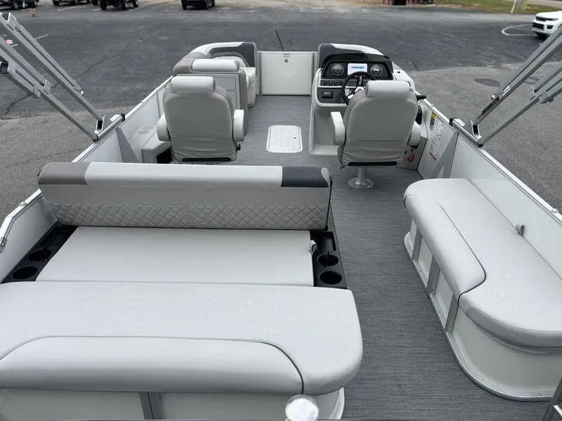 Slide: The Image of 2025 Godfrey SWEETWATER 2286 SFL pontoon boat interior with seating and helm. - 20