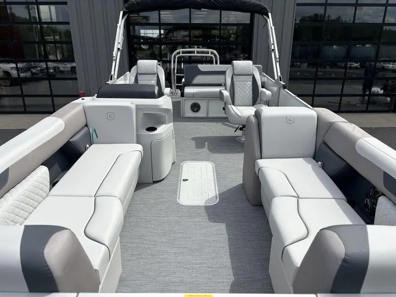 Slide: The Image of 2025 Godfrey SWEETWATER 2286 SFL pontoon boat with spacious seating and modern design. - 7