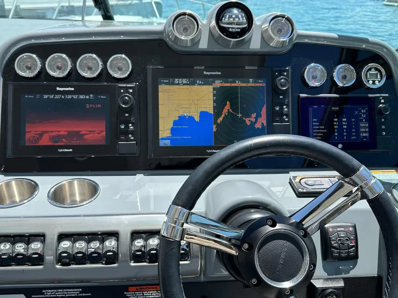 Slide: The Image of Control panel of a 2017 Formula 370 Super Sport boat with navigation displays. - 11