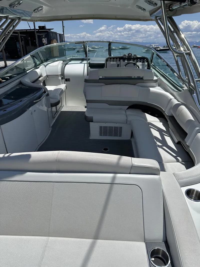 Slide: The Image of 2017 Formula 370 Super Sport boat interior with luxurious seating and modern dashboard. - 17