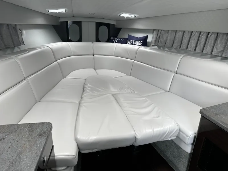 Slide: The Image of Luxurious white leather interior of 2017 Formula 370 Super Sport boat cabin. - 28