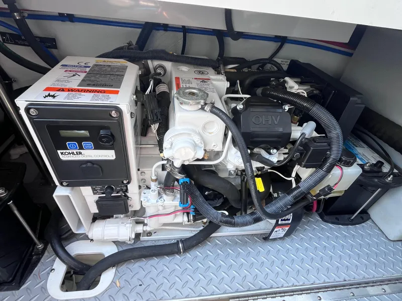 Slide: The Image of Engine compartment of a 2017 Formula 370 Super Sport boat with Kohler generator. - 45
