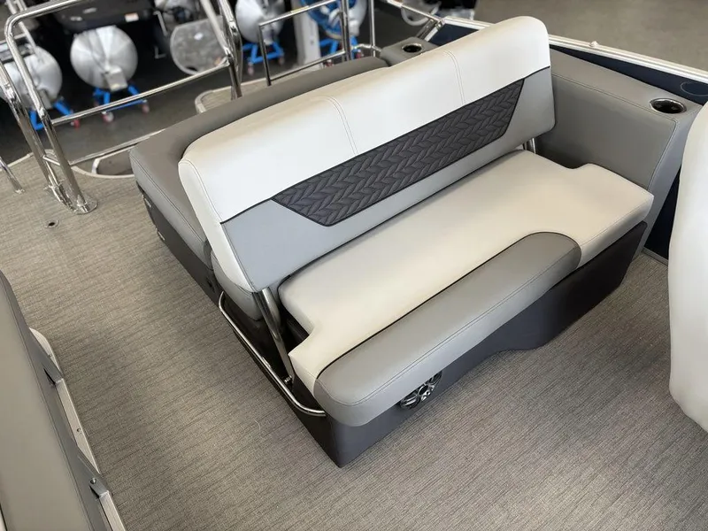 Slide: The Image of 2025 Godfrey Monaco 235 SFL boat interior with gray seating and modern design. - 15