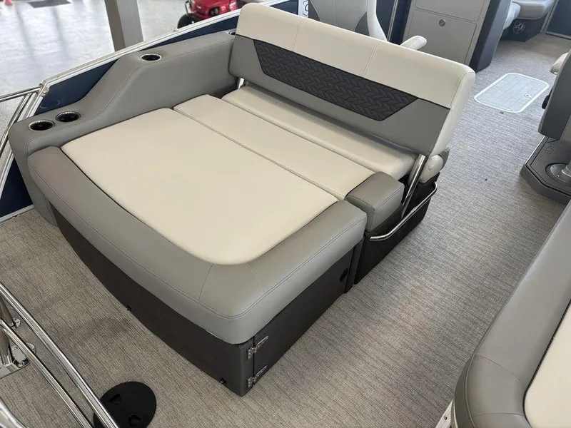Slide: The Image of 2025 Godfrey Monaco 235 SFL boat interior with gray seating and cup holders. - 18