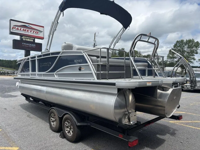 Slide: The Image of 2025 Godfrey Monaco 235 SFL pontoon boat on trailer, outdoor dealership display. - 5