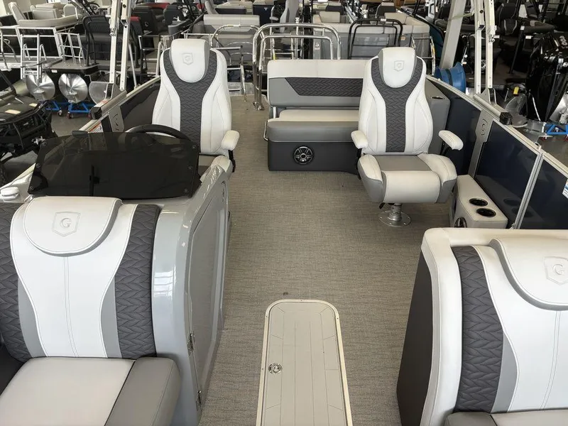 Slide: The Image of 2025 Godfrey Monaco 235 SFL boat interior with luxurious seating and modern design. - 8