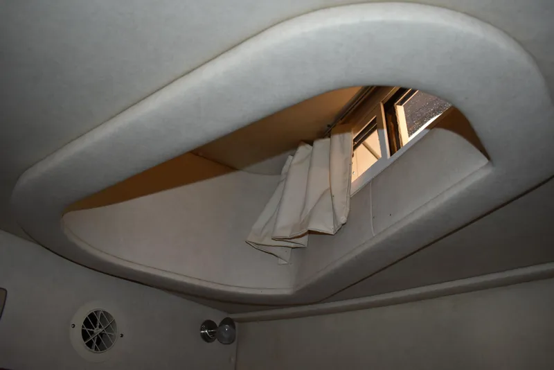 Slide: The Image of Interior cabin window of 2011 Sea Ray 310 Sundancer boat. - 49