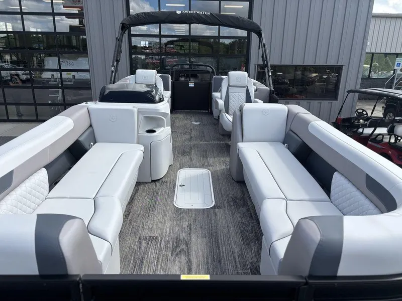Slide: The Image of 2025 Godfrey SWEETWATER 2286 SB pontoon boat with spacious seating and modern design. - 11
