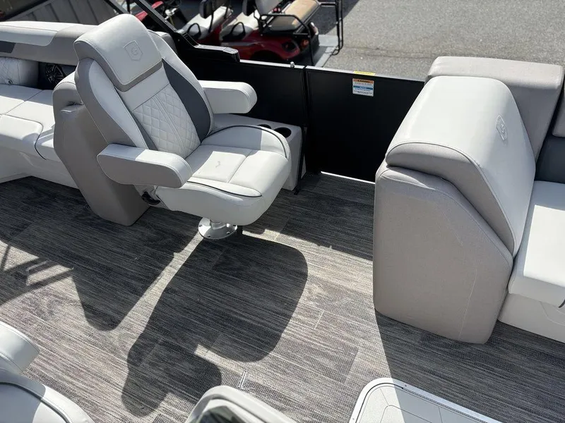 Slide: The Image of Luxurious seating on 2025 Godfrey SWEETWATER 2286 SB pontoon boat, featuring modern design and comfort. - 18