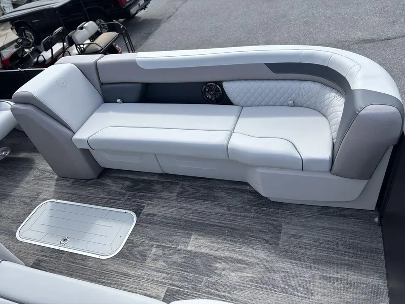 Slide: The Image of 2025 Godfrey SWEETWATER 2286 SB boat interior with sleek seating and modern design. - 6