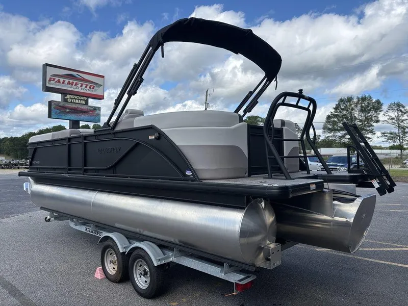 Slide: The Image of 2025 Godfrey SWEETWATER 2286 SB pontoon boat on trailer, outdoor display. - 9