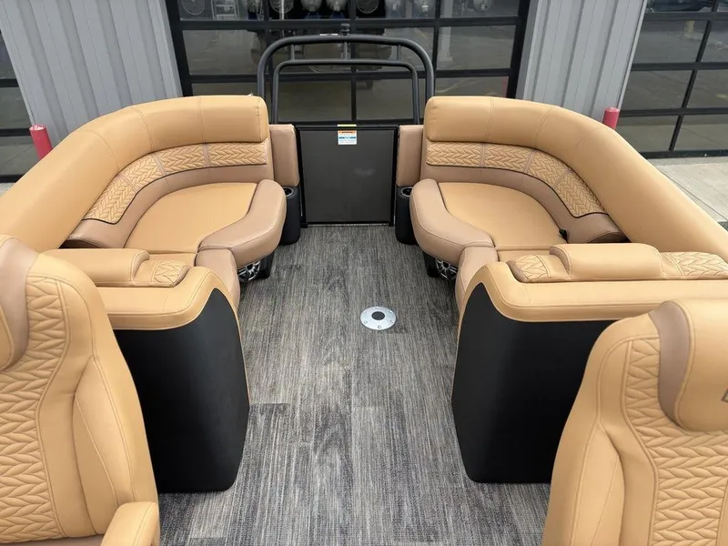 Slide: The Image of Luxurious interior of 2025 Godfrey Monaco 235 SB pontoon boat with tan seating. - 14