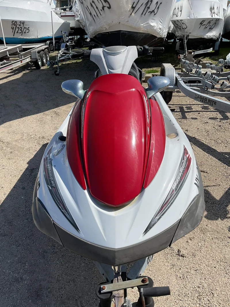 Slide: The Image of 2005 Yamaha WaveRunner FX Cruiser, red and white, parked on a trailer. - 3