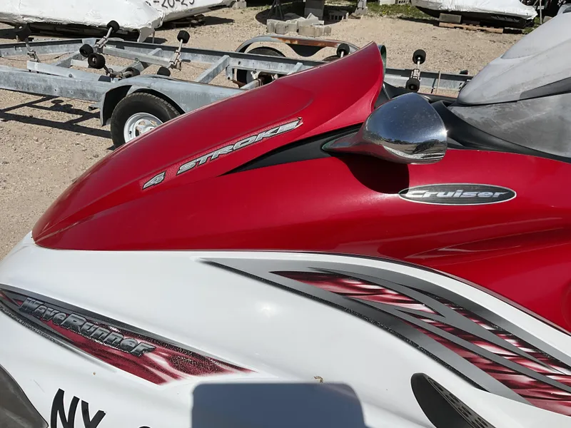Slide: The Image of 2005 Yamaha WaveRunner FX Cruiser, red and white, parked on a trailer. - 6