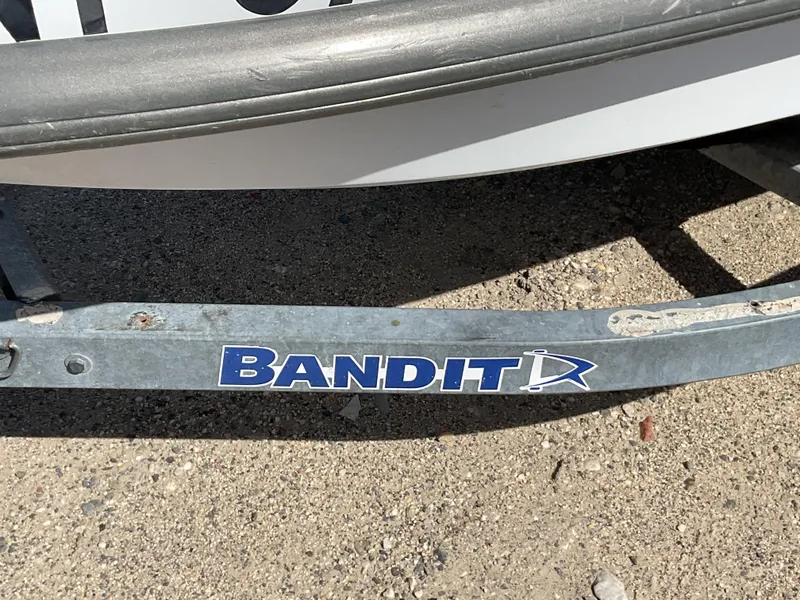 Slide: The Image of Bandit trailer with Yamaha WaveRunner FX Cruiser, 2005 model, on sandy ground. - 9