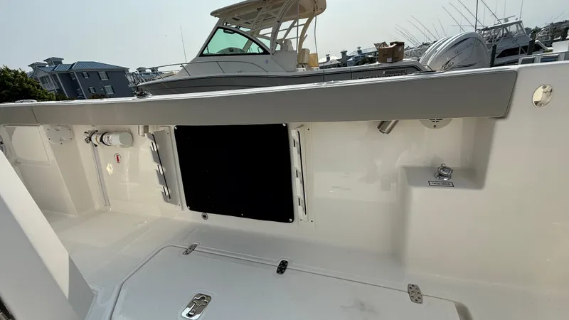 Slide: The Image of 2025 Pursuit S 328 Sport boat interior, featuring sleek design and modern amenities. - 26