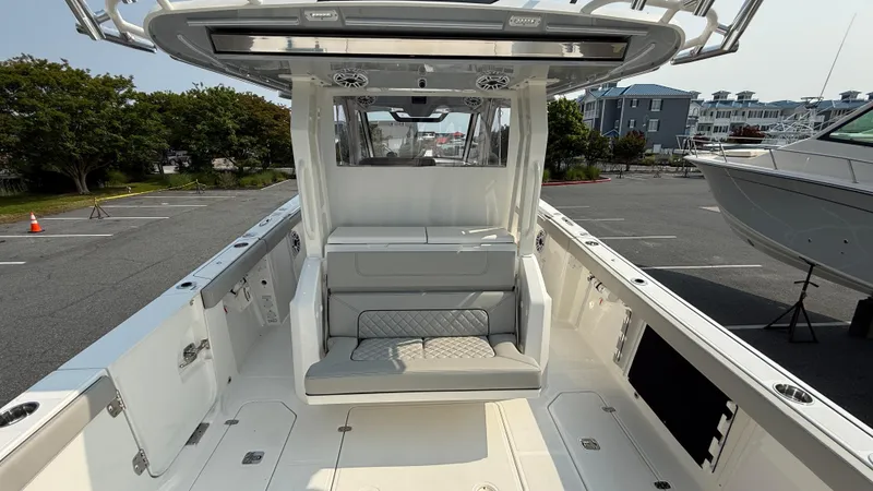 Slide: The Image of 2025 Pursuit S 328 Sport boat interior with seating and modern design. - 31