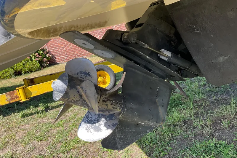 Slide: The Image of 2006 Chaparral 256 SSi boat propeller and drive system on a trailer. - 12