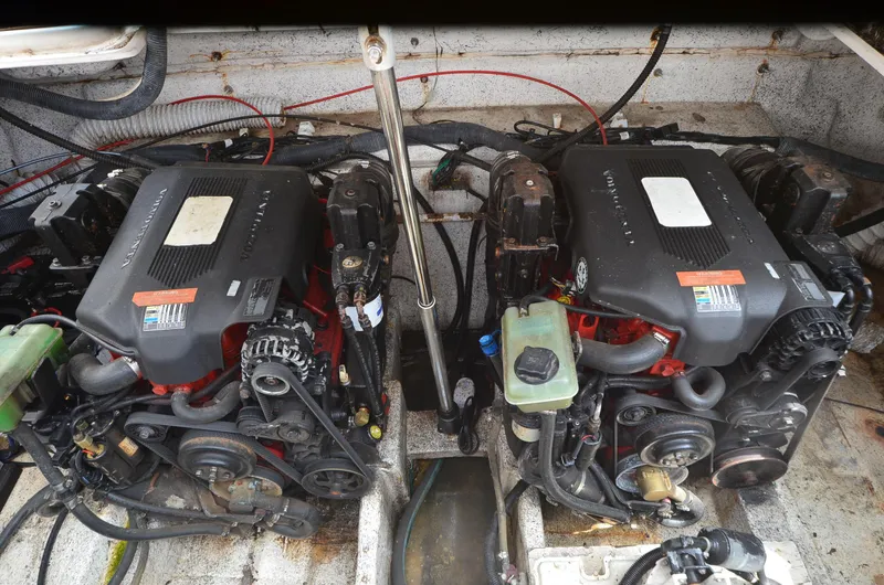 Slide: The Image of Twin engines in a 2006 Rinker 342 Fiesta Vee boat engine compartment. - 33