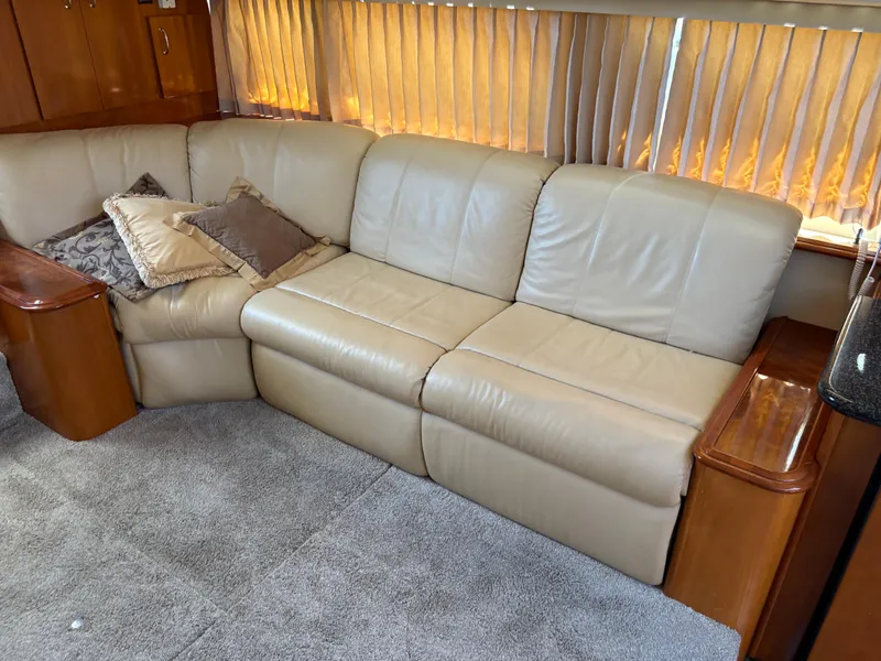 Slide: The Image of Luxurious beige leather sofa in 2005 Carver 44 CPMY yacht interior. - 21