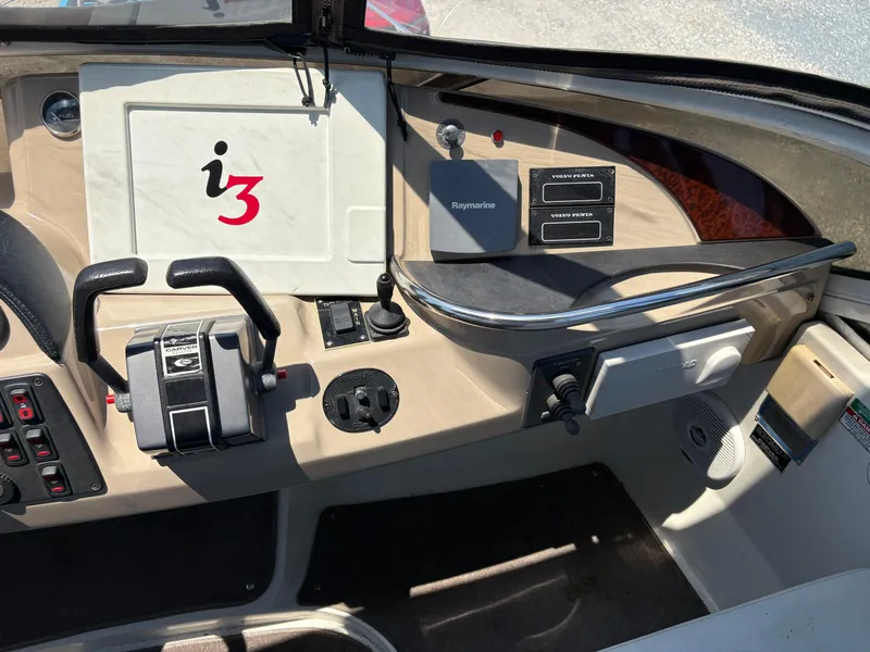 Slide: The Image of Control panel of a 2005 Carver 44 CPMY boat with navigation equipment. - 7