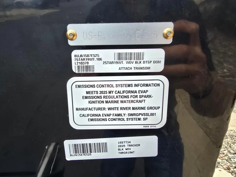 Slide: The Image of 2025 Tracker Targa V-19 WT emissions control information label on black surface. - 6