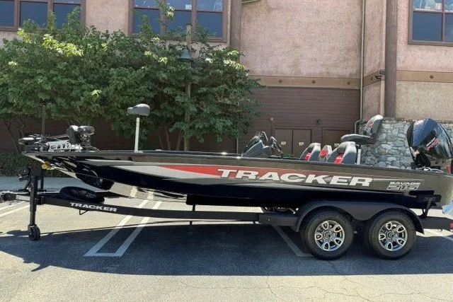 The Image of 2025 Tracker Savage 215 boat on trailer, parked outdoors. - 0