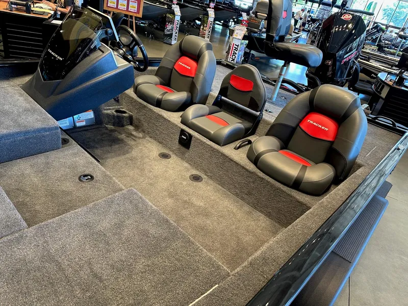 Slide: The Image of 2025 Tracker Savage 215 boat interior with sleek seating and modern design. - 3