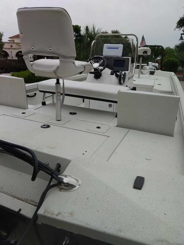 Slide: The Image of 2025 Ranger RB210 boat deck with seating and navigation equipment. - 3