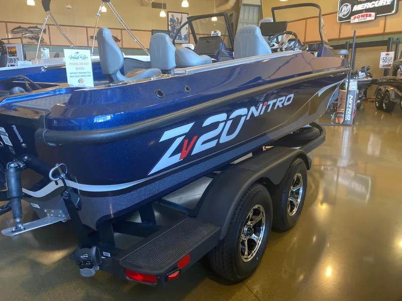 The Image of 2025 Nitro ZV20 Pro boat on display in showroom, featuring sleek design and modern features. - 0