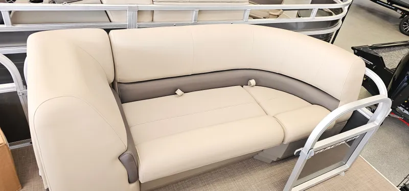 Slide: The Image of 2025 Sun Tracker Party Barge 18 DLX pontoon boat seating, beige and gray upholstery. - 5