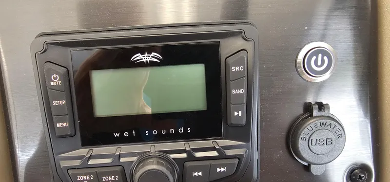 Slide: The Image of Control panel of 2025 Sun Tracker Party Barge 18 DLX with Wet Sounds audio system. - 9