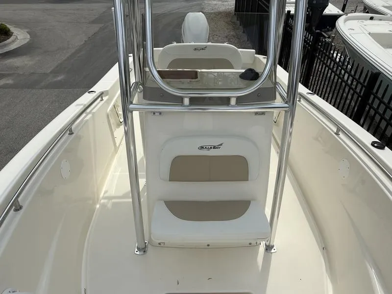 Slide: The Image of 2025 Bulls Bay 230 Center Console boat with sleek design and sturdy railing. - 3