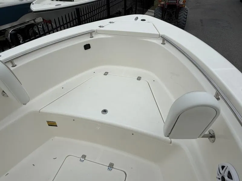 Slide: The Image of 2025 Bulls Bay 230 Center Console boat interior, featuring spacious seating and storage areas. - 5