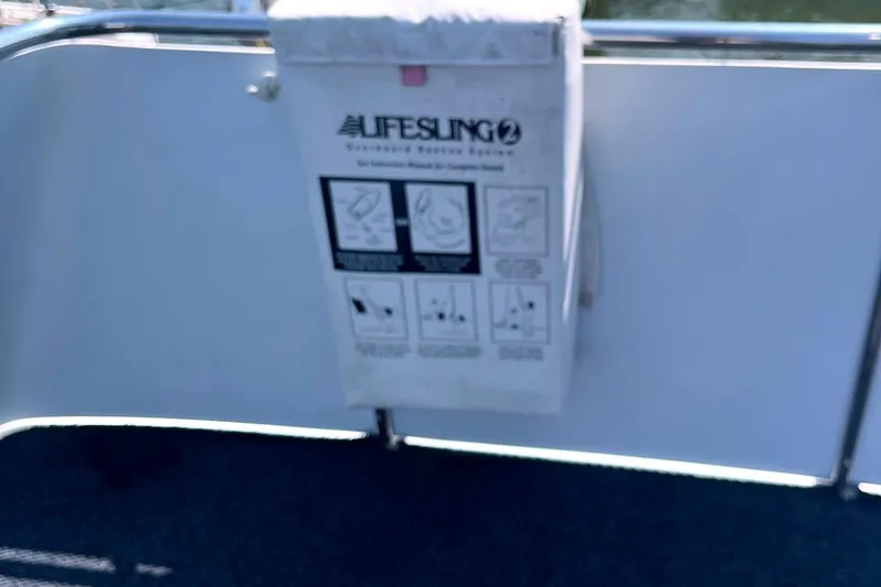 Slide: The Image of Lifesling overboard rescue system on 1999 Jefferson Marquessa 56 yacht deck. - 17