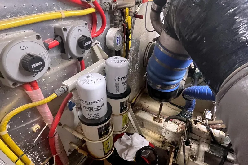 Slide: The Image of Engine room of 1999 Jefferson Marquessa 56 with Detroit Power Guard filters and wiring. - 25