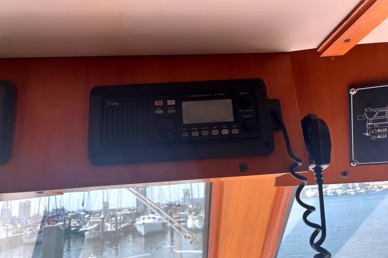 Slide: The Image of Boat radio system on a 1999 Jefferson Marquessa 56, overlooking marina. - 32