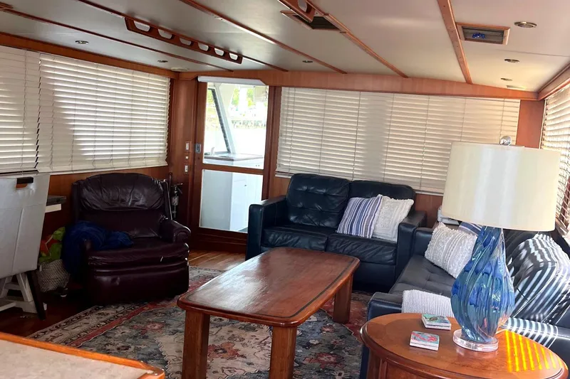 Slide: The Image of Interior of 1999 Jefferson Marquessa 56 yacht with cozy seating and elegant decor. - 36