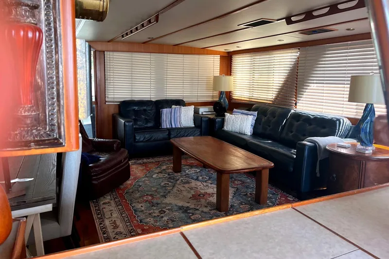 Slide: The Image of Luxurious interior of a 1999 Jefferson Marquessa 56 yacht with leather seating and elegant decor. - 43