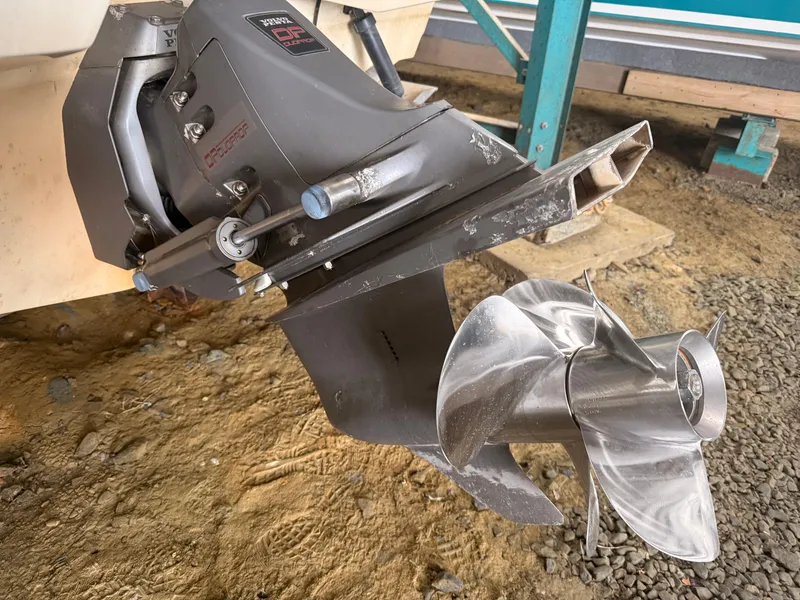 Slide: The Image of Close-up of a 2001 Wellcraft 2600 Martinique boat propeller and outdrive. - 8