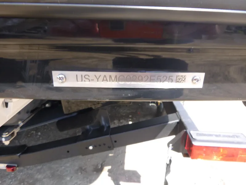 Slide: The Image of 2025 Yamaha Boats AR220 hull identification number on a trailer. - 16