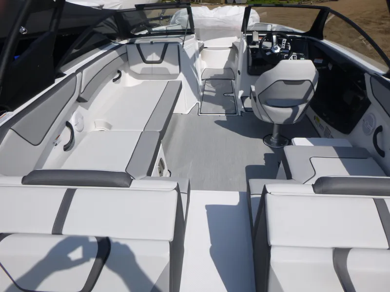 Slide: The Image of 2025 Yamaha Boats AR220 interior with modern seating and sleek design. - 3