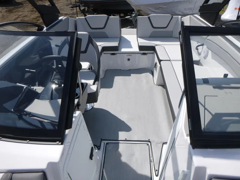 Slide: The Image of 2025 Yamaha Boats AR220 interior with modern seating and sleek design. - 4