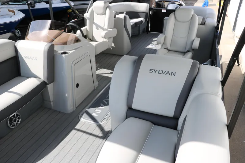 Slide: The Image of 2025 Sylvan Mirage X3 boat interior with luxurious seating and modern design. - 13
