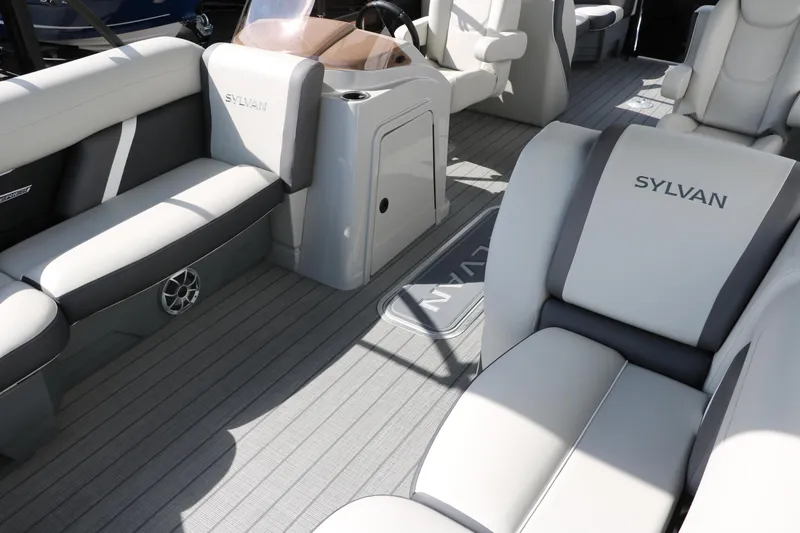 Slide: The Image of 2025 Sylvan Mirage X3 boat interior with luxurious seating and modern design. - 14