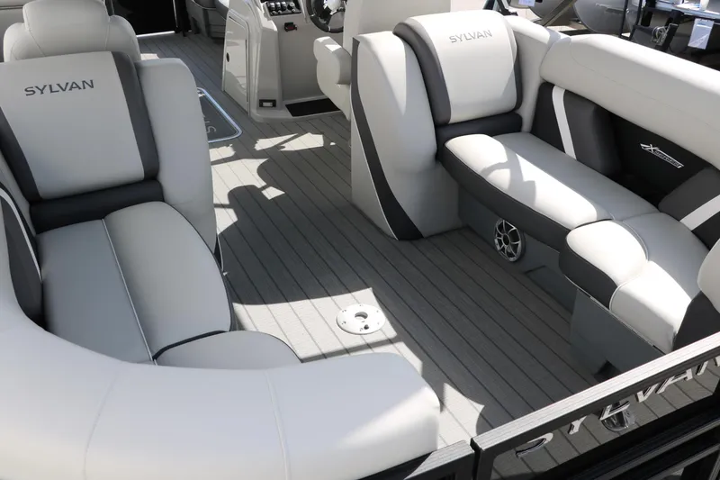 Slide: The Image of Luxurious seating on 2025 Sylvan Mirage X3 pontoon boat with modern design and spacious layout. - 17