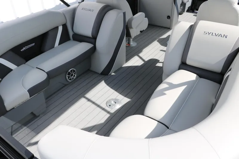 Slide: The Image of Interior of 2025 Sylvan Mirage X3 pontoon boat with luxurious seating and modern design. - 23