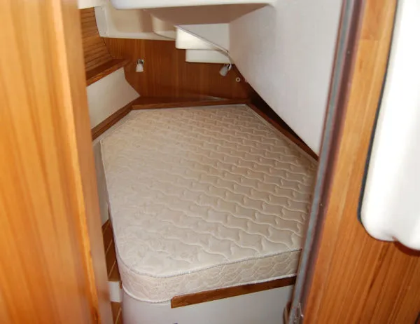 Slide: The Image of Cozy cabin interior of 2026 Catalina 446 sailboat with a comfortable mattress. - 19